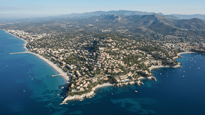 Aerial view of the Provence-Alpes-Côte d'Azur region, highlighting the stunning Mediterranean coastline and luxury real estate in the area, capturing the Real Estate Boom along France's south coast.