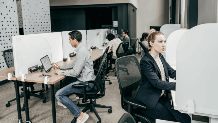 A modern French tech hub with young entrepreneurs working on blockchain projects, representing innovation beyond CAC 40.